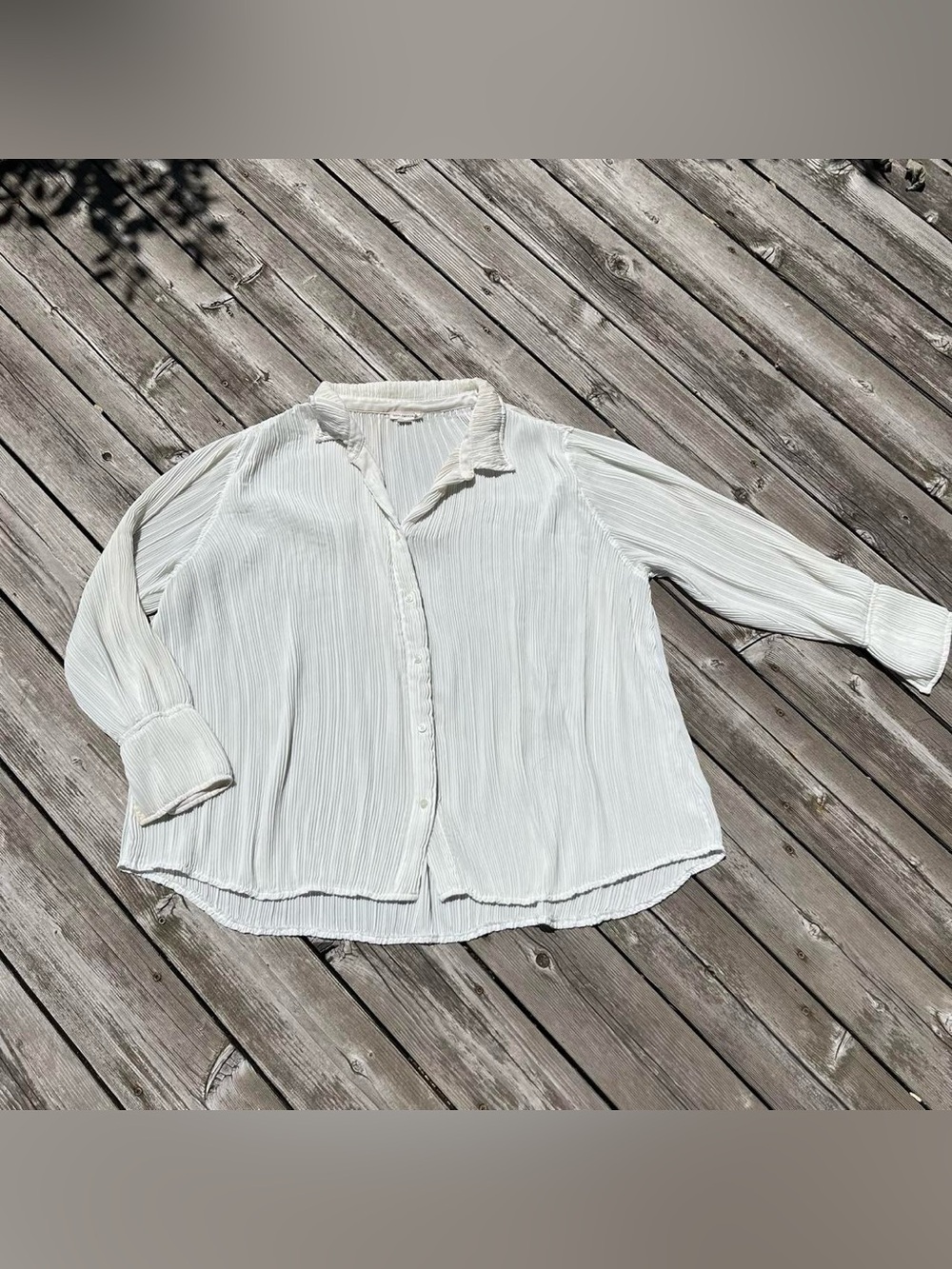 Good American white pleated button up blouse